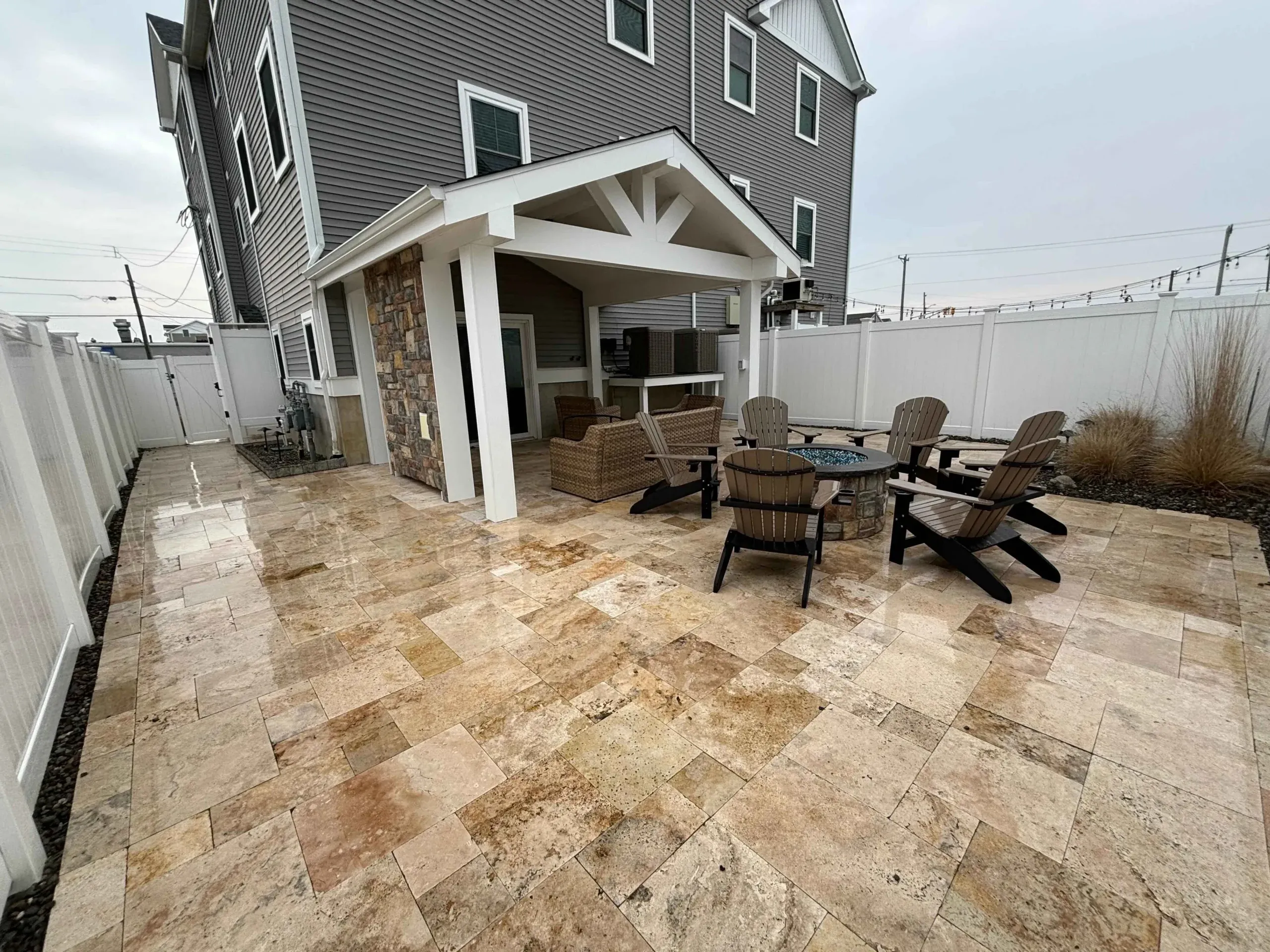 Backyard patio with light rain | deck winterization | Creative Pavers