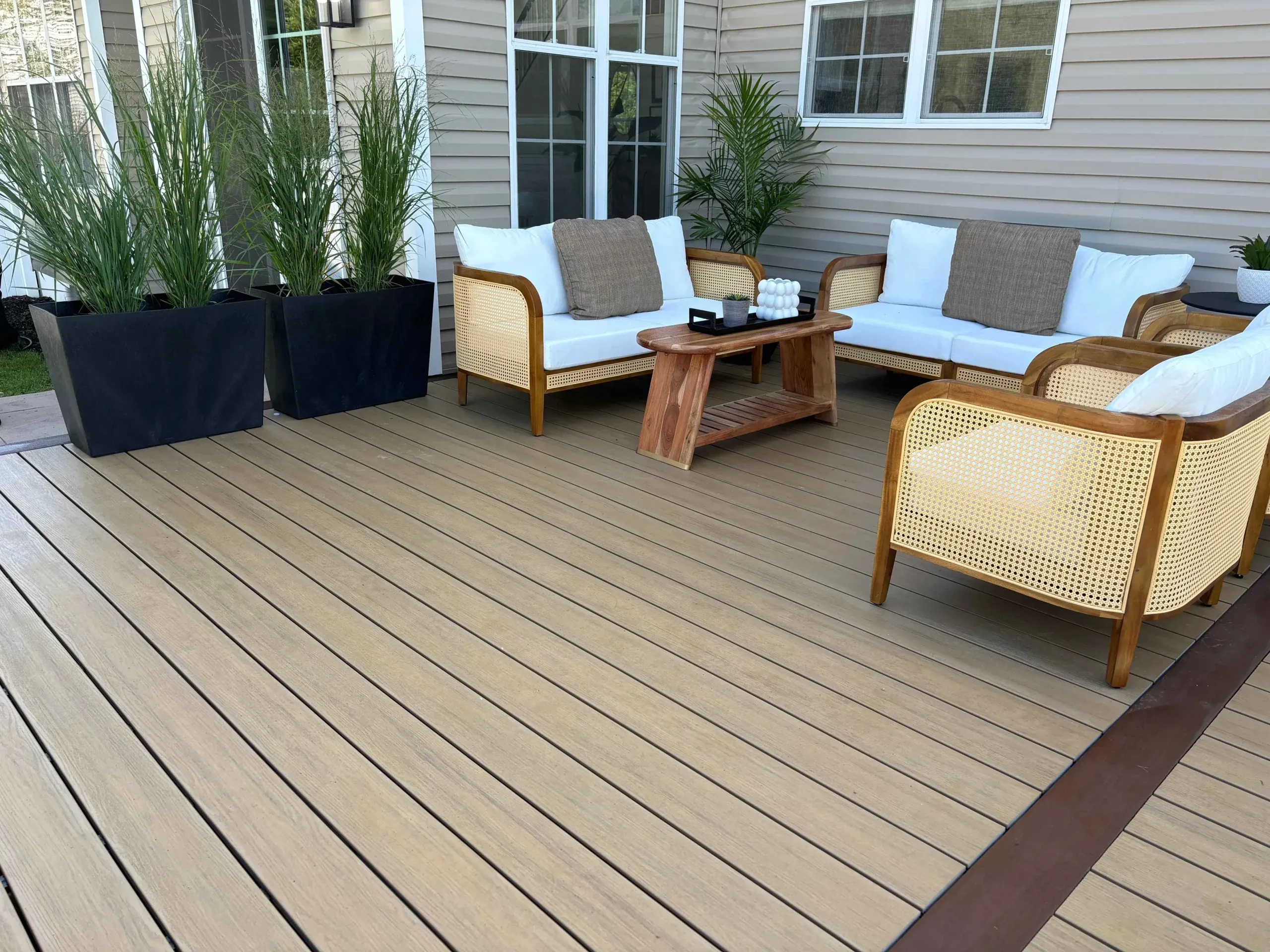 Backyard deck with outdoor seating | deck winterization | Creative Pavers