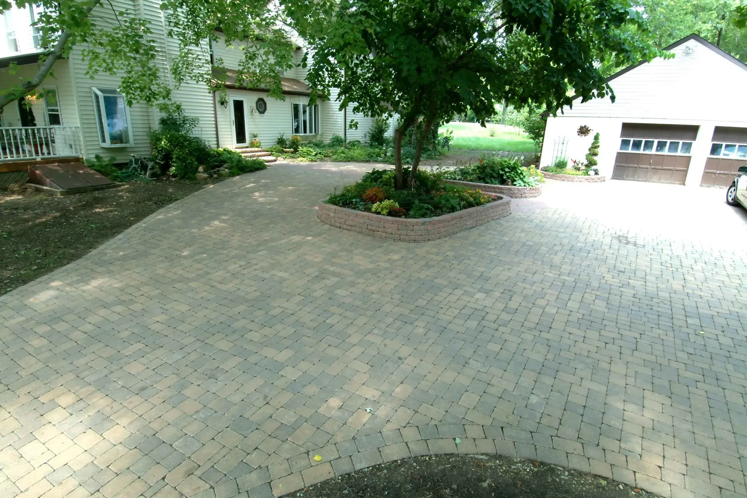 House driveway made of stone pavers | Fall Hardscape Upgrades  | Creative Pavers