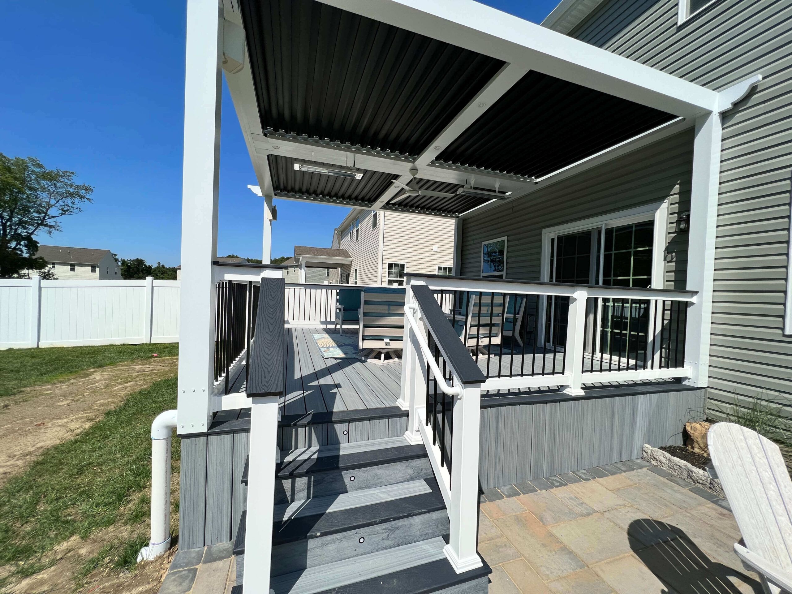Deck with roof on top of it | deck additions | Creative Pavers