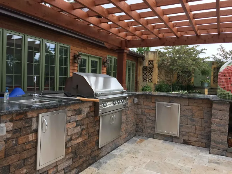 Outdoor kitchen with pergola | patio and deck contractor swedesboro nj | Creative Pavers
