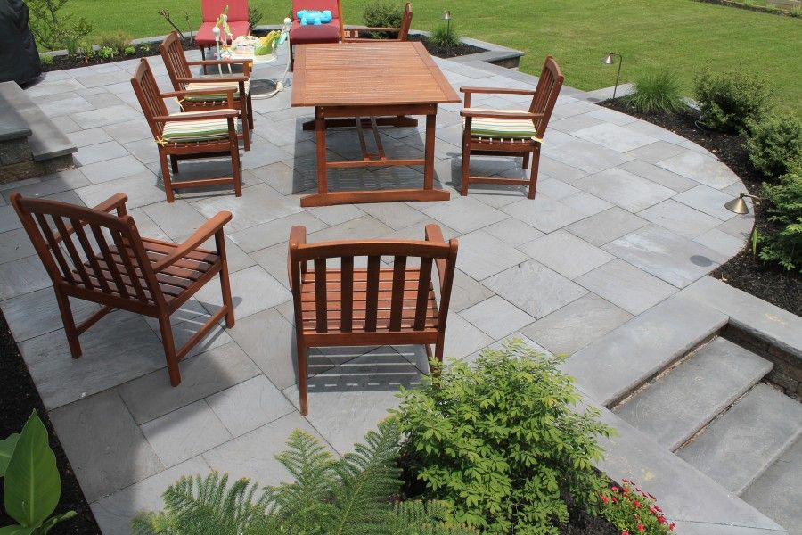 Patio with table and chairs | outdoor living design Gibbstown, NJ | Creative Pavers