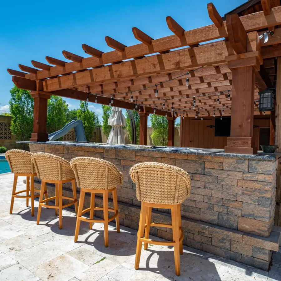 Pergola with counter and chairs | hardscape landscaper contractor Radnor Township Pennsylvania | Creative Pavers, Inc.